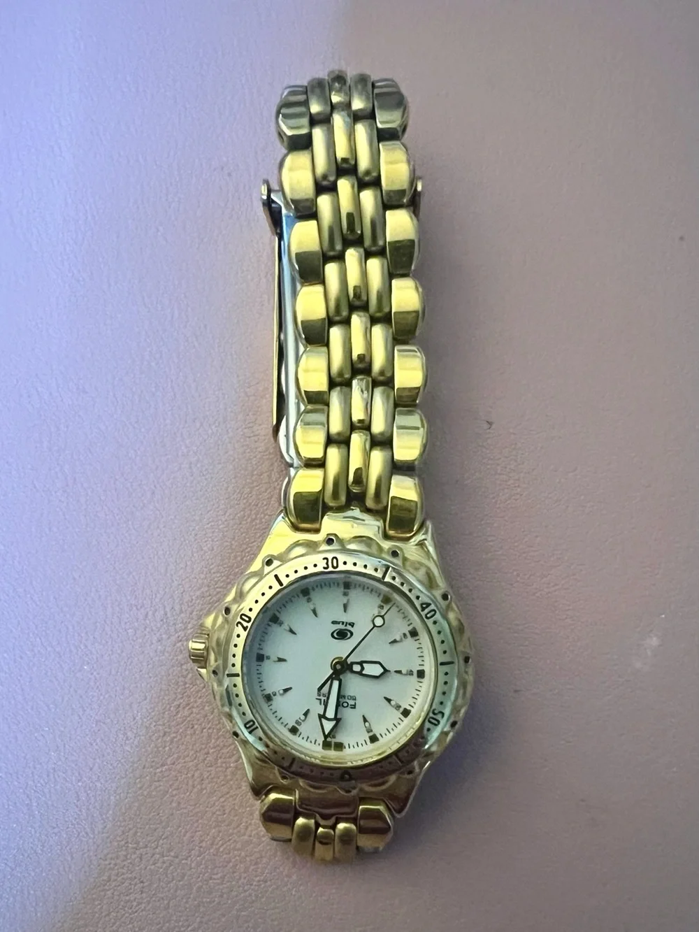 Ladies gold Fossil bracelet watch